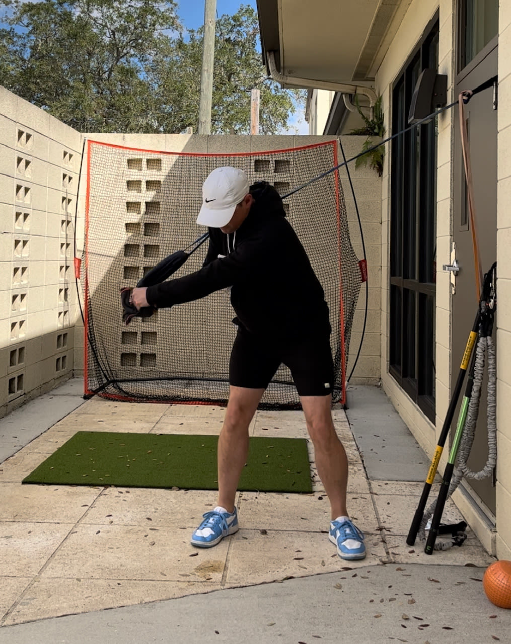 The resistance band pulldown from the top of the backswing.