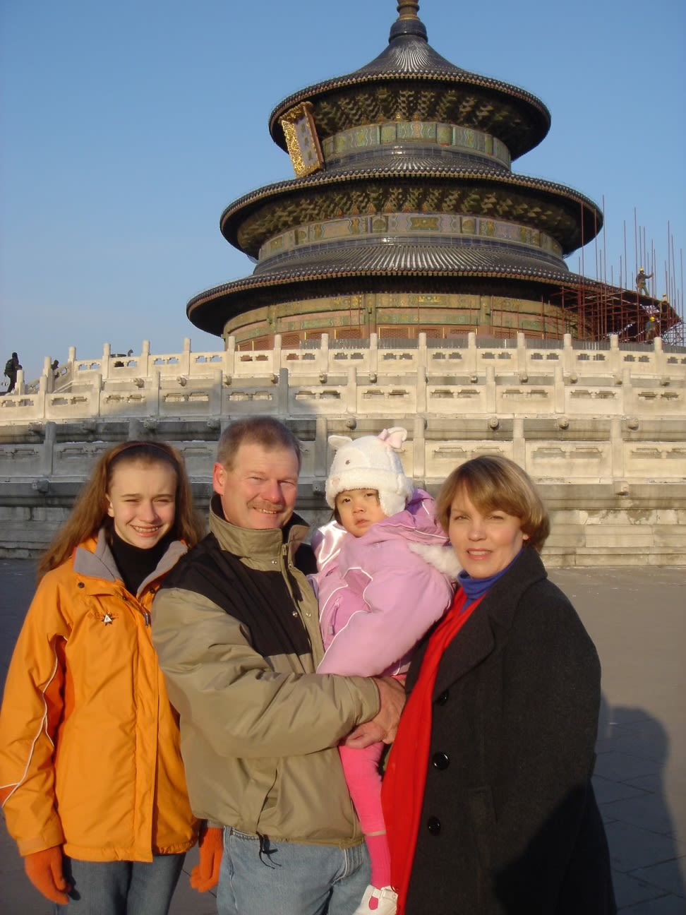 A young Emily Gustafson and her family in China.