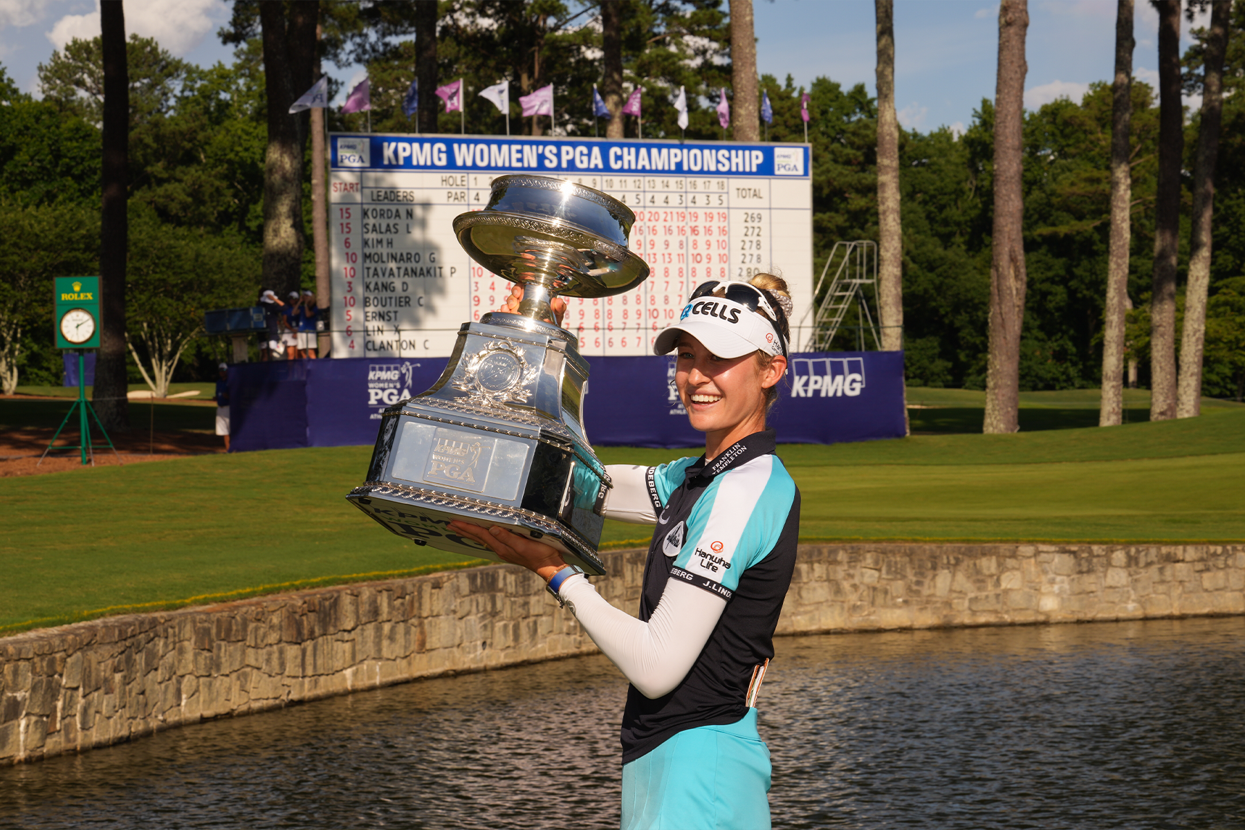 Nelly Korda lifts the LPGA Championship Trophy after her win at the Atlanta Athletic Club in 2021.