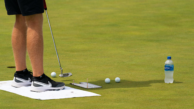 A contestant makes his putt on the practice greens during the third round for the 46th Boys and Girls Junior PGA Championship held at Cog Hill Golf & Country Club on August 4, 2022 in Lemont, Illinois. (Photo by Hailey Garrett/PGA of America)