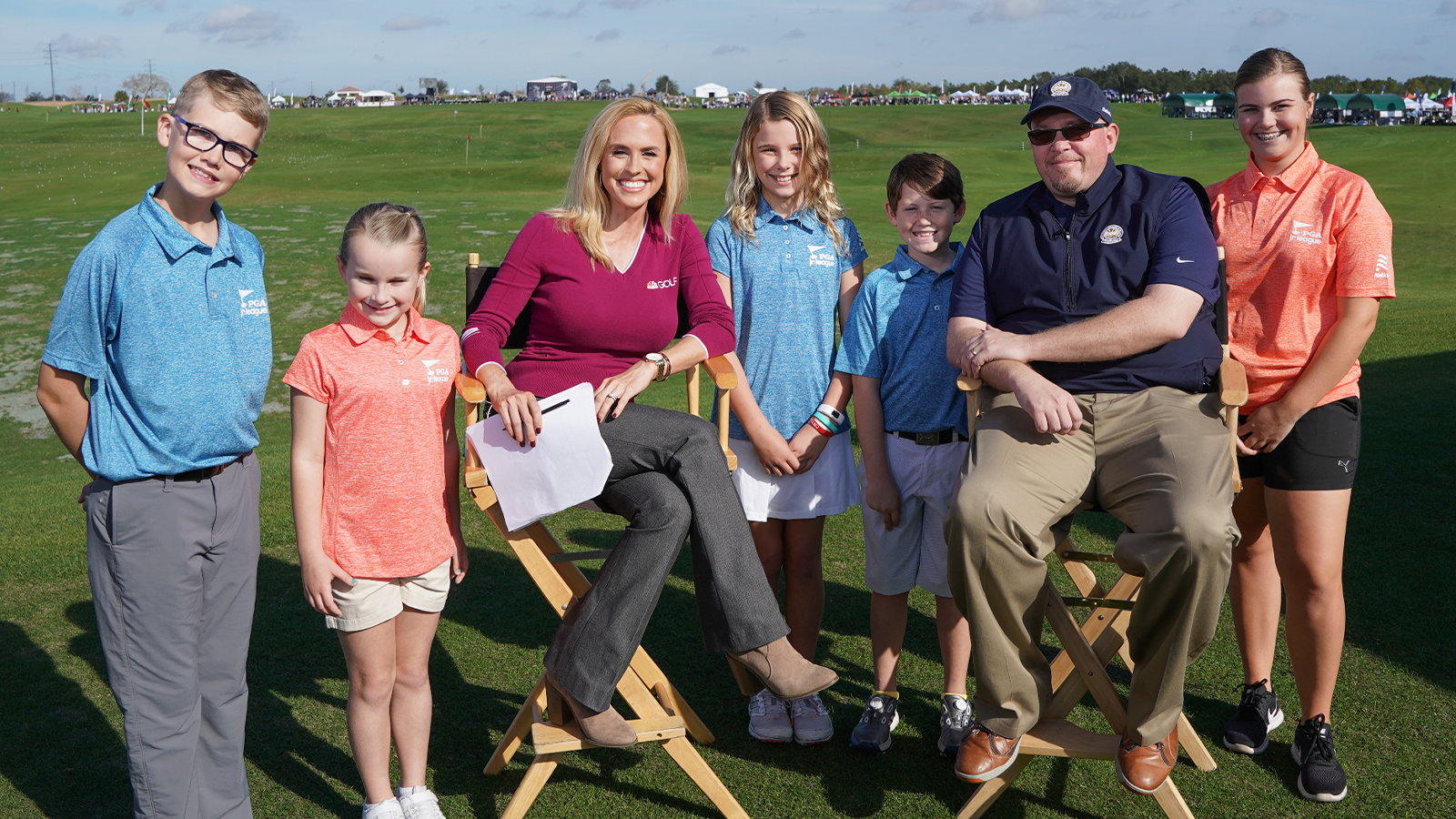 Golf Channel's Lauren Thompson with Brendon Elliott and Jr. League members on Morning Drive during DEMO day held at Orange County National Golf Center