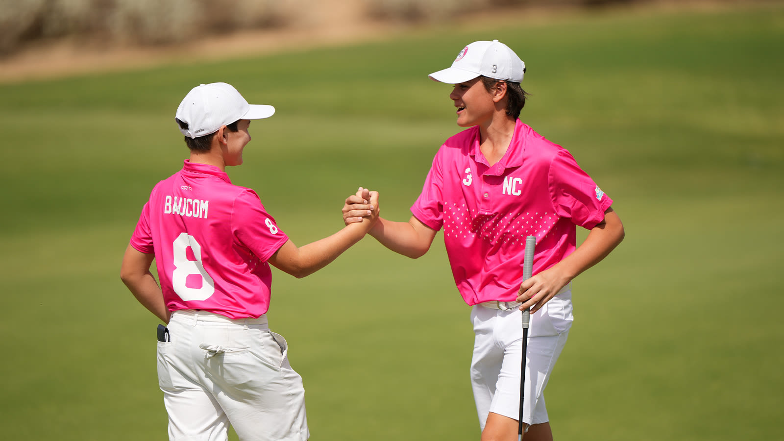  Graden Lomax reacts with Grayson Baucom of Team North Carolina after scoring a birdie on the 15th hole during the second round of the 2022 National Car Rental PGA Jr. League Championship at Grayhawk Golf Club on October 8, 2022 in Scottsdale, Arizona. (Photo by Darren Carroll/PGA of America)