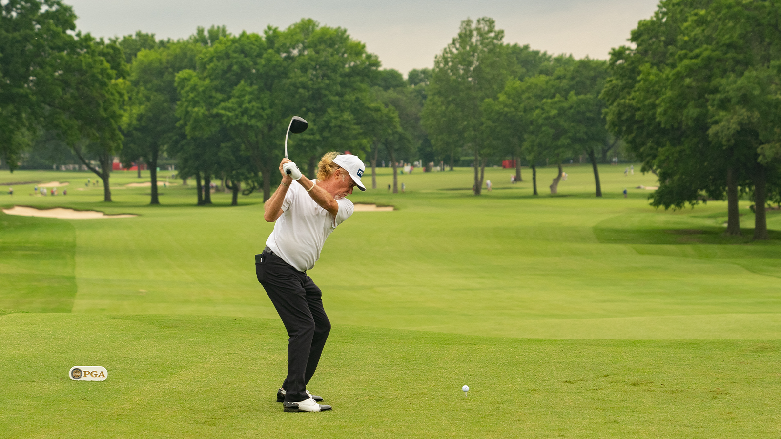 Miguel Angel Jimenez of Spain hits his tee shot on the fifth hole during the first round of the 81st KitchenAid Senior PGA Championship held at the Southern Hills Country Club on May 27, 2021 in Tulsa, Oklahoma. (Photo by Darren Carroll/PGA of America)