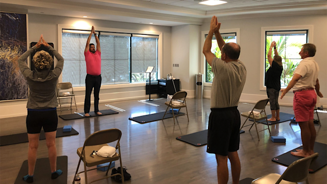 Steve Buzza, PGA, teaches a fitness class to golfers.
