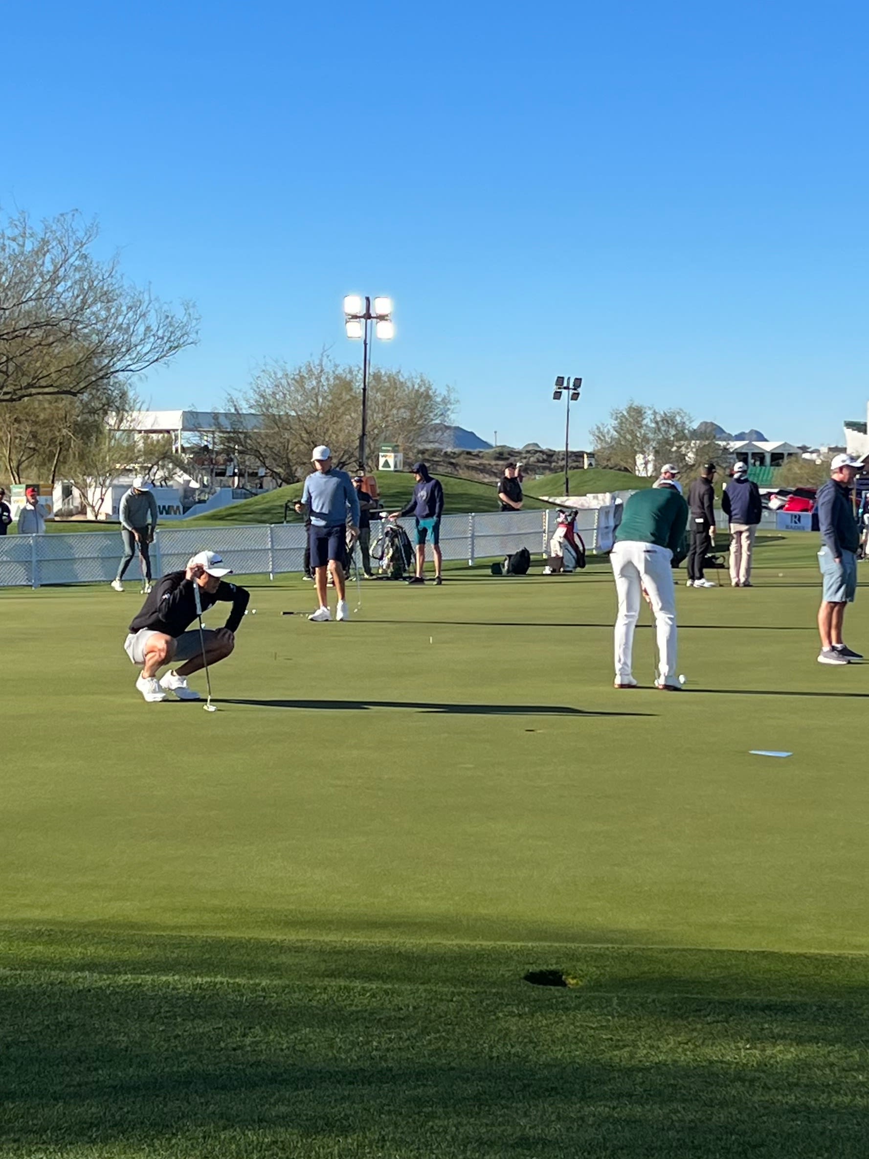 Collin Morikawa practicing his putting at TPC Scottsdale prior to the WM Phoenix Open.