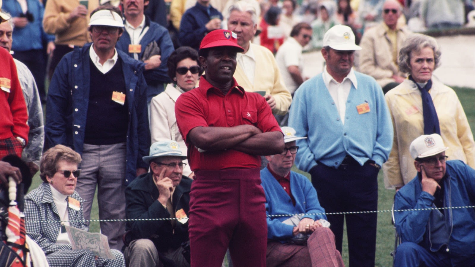 Lee Elder watches his shot in front of a small gallery during the 1975 Masters Tournament at Augusta National Golf Club in Augusta, Georgia. (Photo by Augusta National/Getty Images)