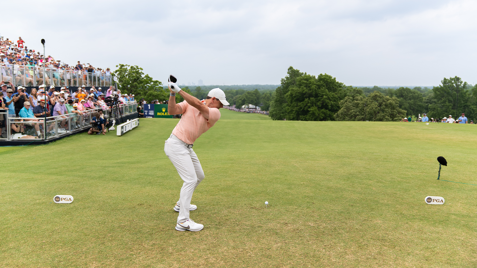 Rory McIlroy of Northern Ireland hits his shot from the first tee during the second round of the 2022 PGA Championship at the Southern Hills on May 20, 2022 in Tulsa, Oklahoma. (Photo by Darren Carroll/PGA of America)