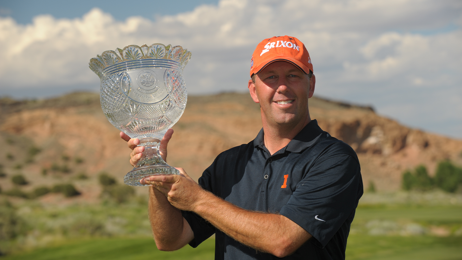 Champion Mike Small with the Walter Hagen Cup at the awards ceremony on hole 18 green following the final round of the 42nd PGA Professional National Championship at Twin Warriors Golf Club in Santa Ana Pueblo, New Mexico, USA, on Wednesday, July 1, 2009. (Photo by Montana Pritchard/The PGA of America)