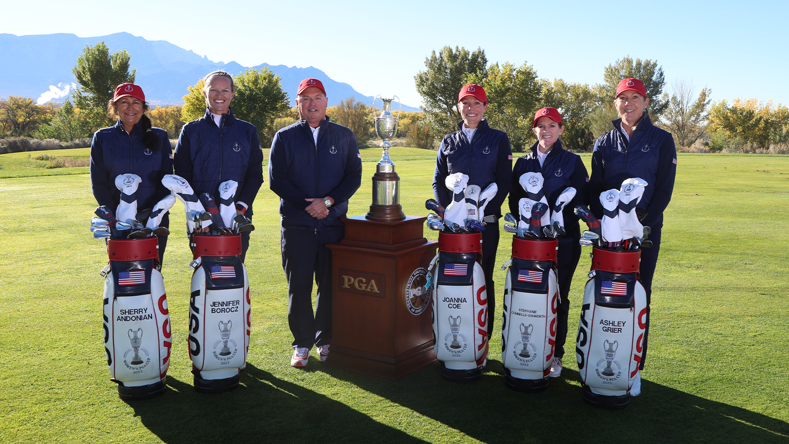 Sherry Andonian, Jennifer Borocz, PGA of America President and Team Captain, Jim Richerson, Joanna Coe, Stephanie Connelly-Eiswerth and Ashley Grier of the U.S. Team pose with the tournament cup before the 2nd Women’s PGA Cup at Twin Warriors Golf Club on Wednesday, October 26, 2022 in Santa Ana Pueblo, New Mexico. (Photo by Sam Greenwood/PGA of America)