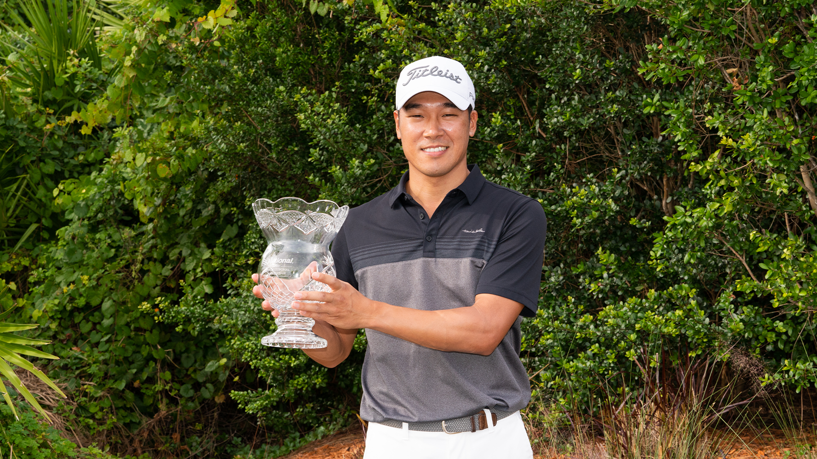 2021 Champion Jin Chung poses for a photo with the trophy after the final round of the 45th National Car Rental Assistant PGA Professional Championship held at the PGA Golf Club on November 14, 2021 in Port St. Lucie, Florida. (Photo by Hailey Garrett/PGA of America)