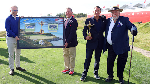 Keith Pelley, CEO of the European Tour and President of the PGA of America Jim Richerson present Kohler Company President and Chief Executive Officer David Kohler and Kohler Company Executive Chairman Herbert Kohler Jr. with a plaque acknowledging their hosting of the 2020 Ryder Cup during Sunday Singles Matches of the 43rd Ryder Cup at Whistling Straits on September 26, 2021 in Kohler, Wisconsin. (Photo by Andrew Redington/Getty Images)