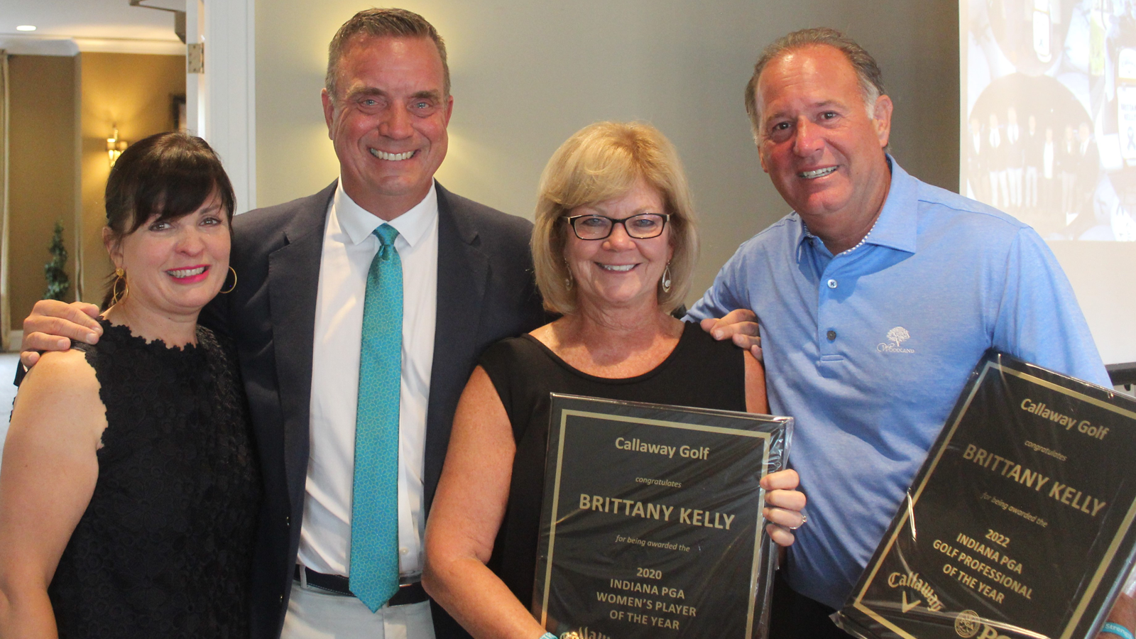 Brittany Kelly's parents Joni and Kim (right) pose with Callaway representative Tim Diedrich and his wife Gabi Diedrich.