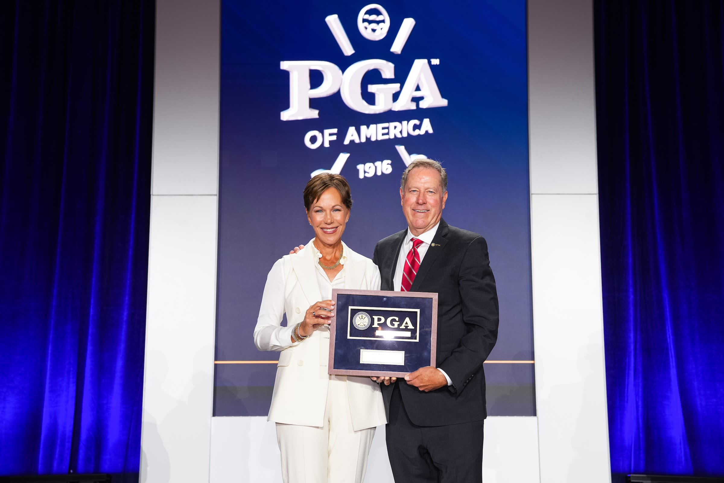 Whaley with PGA President John Lindert.