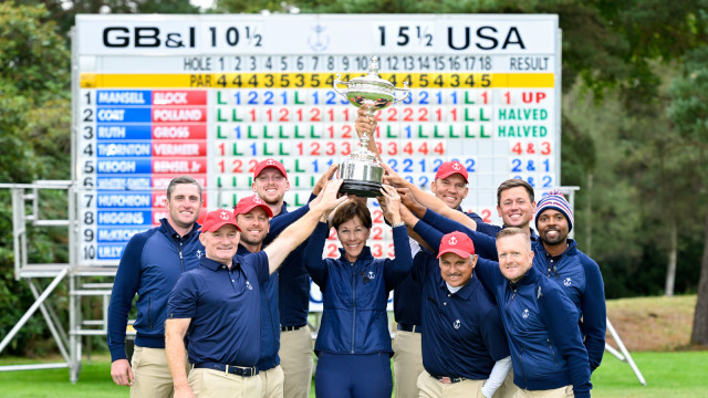 Alex Beach of the United States, Jesse Mueller of the United States, Ben Polland of the United States, Wyatt Worthington II of the United States, Larkin Gross of the United States, Ryan Vermeer of the United States, Frank Bensel Jr. of the United States, Captain and PGA of America Honorary President, Suzy Whaley Omar Uresti of the United States and Jared Jones of the United States pose with the Llandudno trophy after winning the 30th PGA Cup at Foxhills Golf Club on September 18, 2022 in Ottershaw, England. (Photo by Matthew Harris/PGA of America)