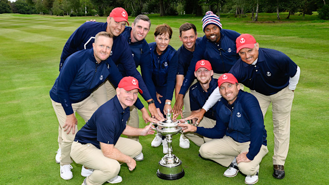 Alex Beach of the United States, Jesse Mueller of the United States, Ben Polland of the United States, Wyatt Worthington II of the United States, Larkin Gross of the United States, Ryan Vermeer of the United States, Frank Bensel Jr. of the United States, Captain and PGA of America Honorary President, Suzy Whaley Omar Uresti of the United States and Jared Jones of the United States pose with the Llandudno trophy after winning the 30th PGA Cup at Foxhills Golf Club on September 18, 2022 in Ottershaw, England. (Photo by Matthew Harris/PGA of America)