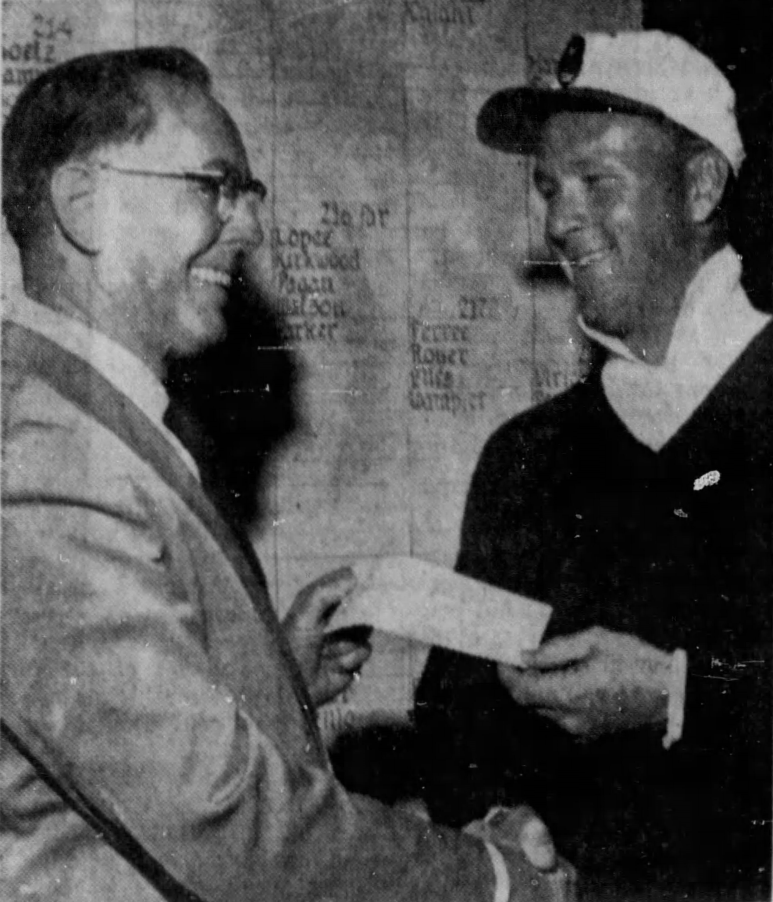 Arnold Palmer gets his winner's check from the West Palm Beach Mayor.