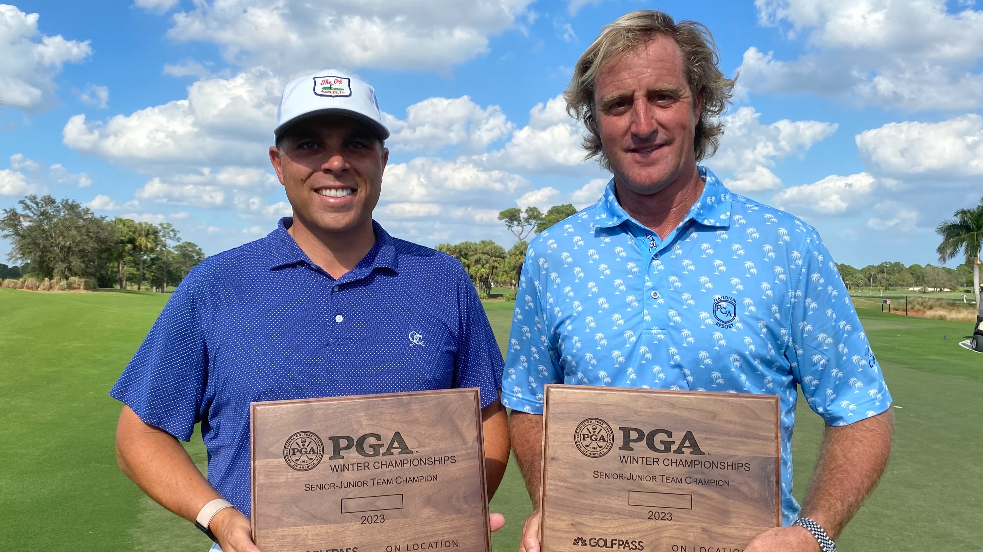 PGA Members Jason Martin (left) and Tim Cantewell pose with their Senior-Junior Team Championship winner plaques.