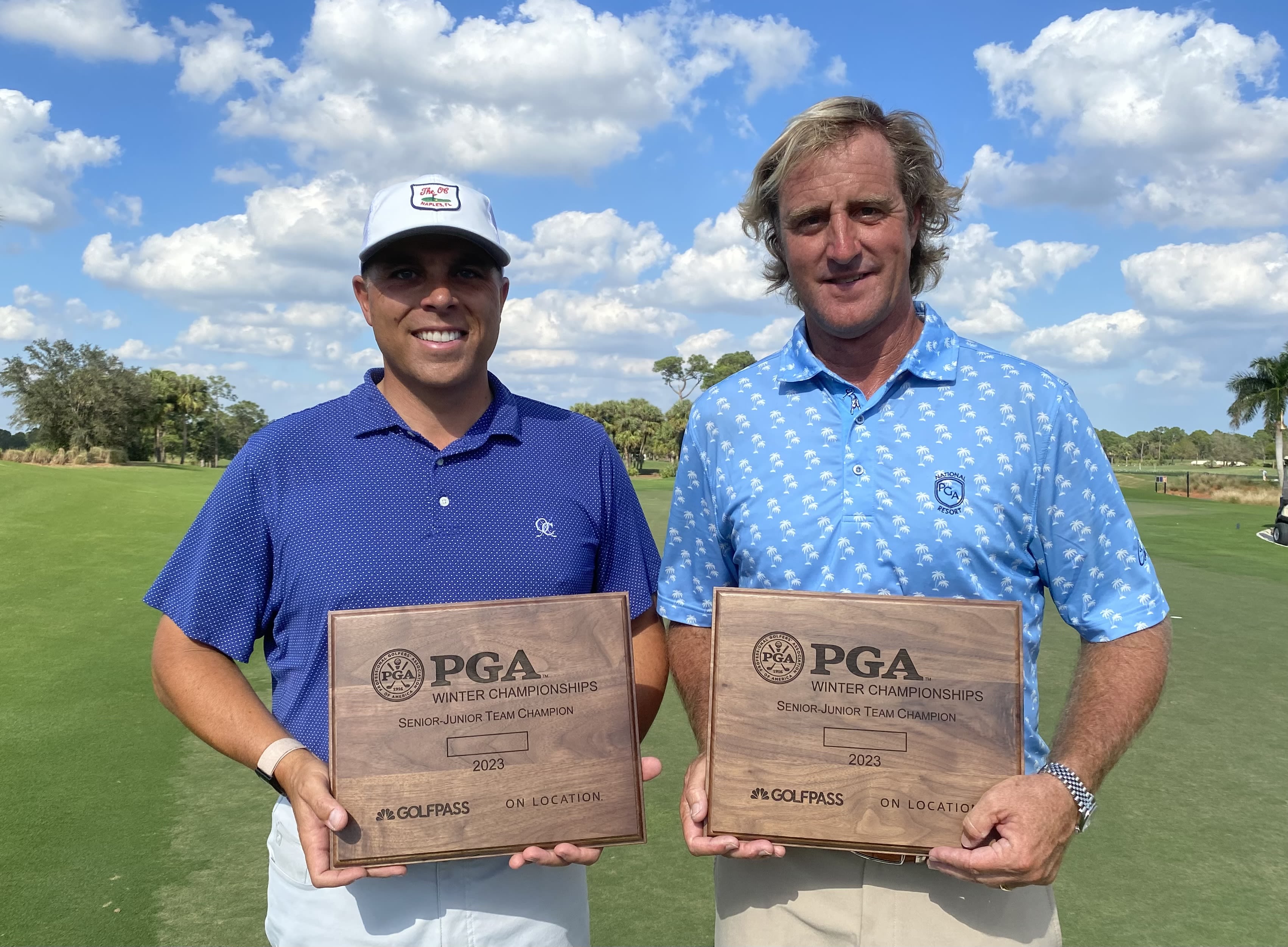 PGA Members Jason Martin (left) and Tim Cantewell pose with their Senior-Junior Team Championship winner plaques.