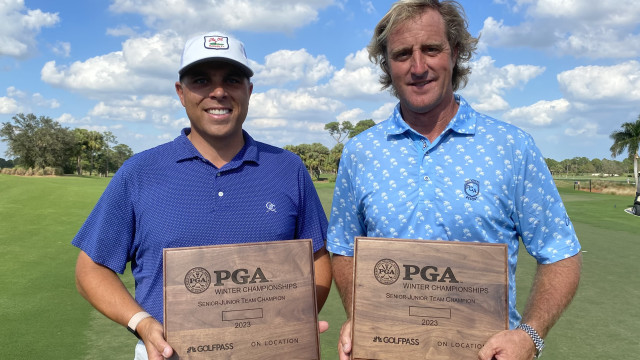 PGA Members Jason Martin (left) and Tim Cantewell pose with their Senior-Junior Team Championship winner plaques.