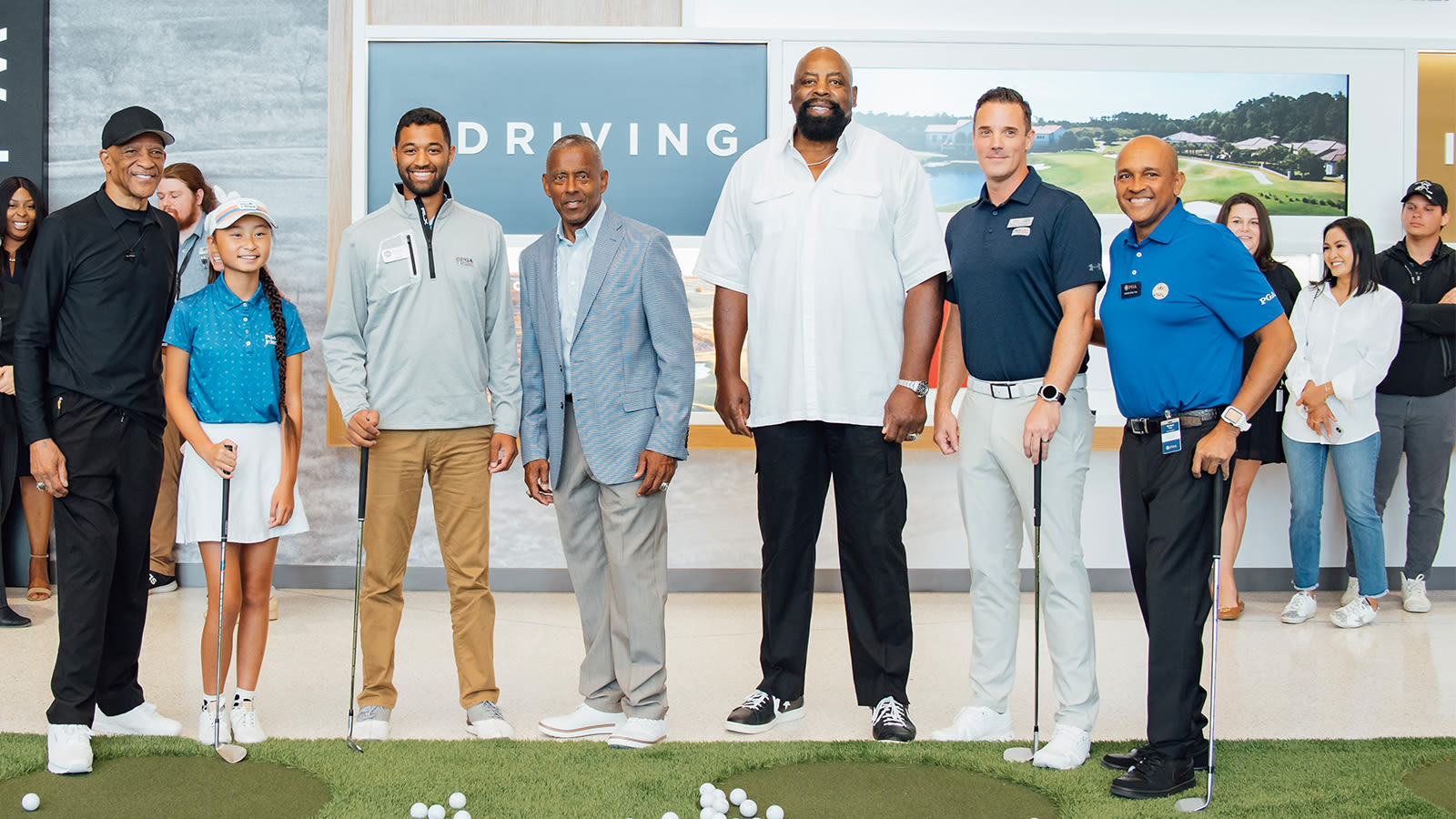 FRISCO, TX - AUGUST 22: Former Dallas Cowboy Player, Drew Pearson, Jr. League Participant, Sailor Chen, PGA WORKS Fellow, Torry Rees, Former Cowboy Player, Tony Dorsett, Former Dallas Cowboy Player, Ed "Too Tall" Jones, Former US Army Staff Sergeant, Paul Hauck and PGA Professional, Kennie Sims pose for a photo during the Welcome Home Celebration at PGA Frisco Campus on August 22, 2022 in Frisco, Texas. (Photo by Daryl Johnson/PGA of America)