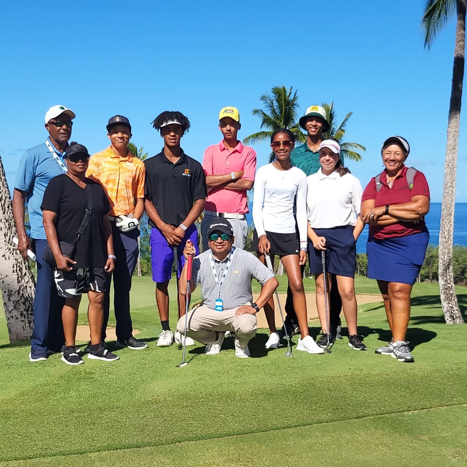 Angel Martinez (middle), Alysa Davis (middle right) and fellow golfers