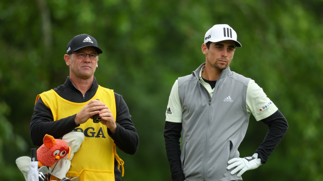 oaquín Niemann of Chile and his caddie Gary Matthews wait to play a shot on the seventh hole during the third round of the 2022 PGA Championship (Photo by Andrew Redington/Getty Images)