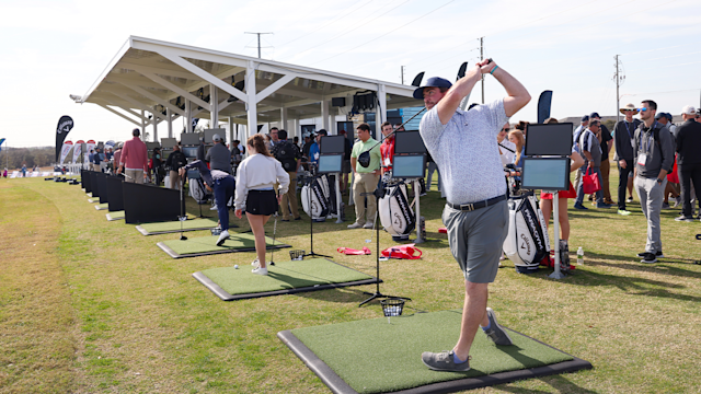 An attendee swings at the TopTracer area during the Demo Day at the 2023 PGA Show at Orange County National Golf Center on Tuesday, January 24, 2023 in Orlando, Florida. (Photo by Scott Halleran/PGA of America)