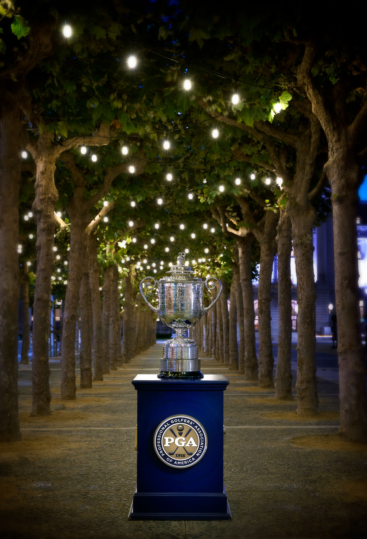 The Wanamaker Trophy sits among the lighted paths near San Francisco City Hall.
