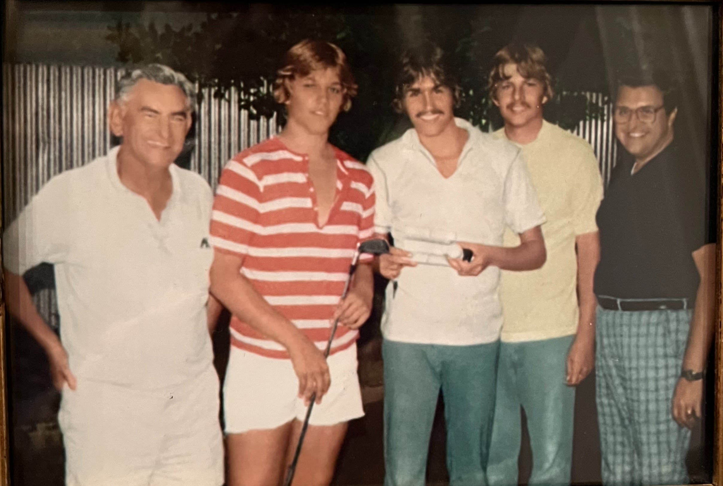 Post-round smiles with my great grandpa, uncles and grandpa (far right) after my Uncle Joe's ace.