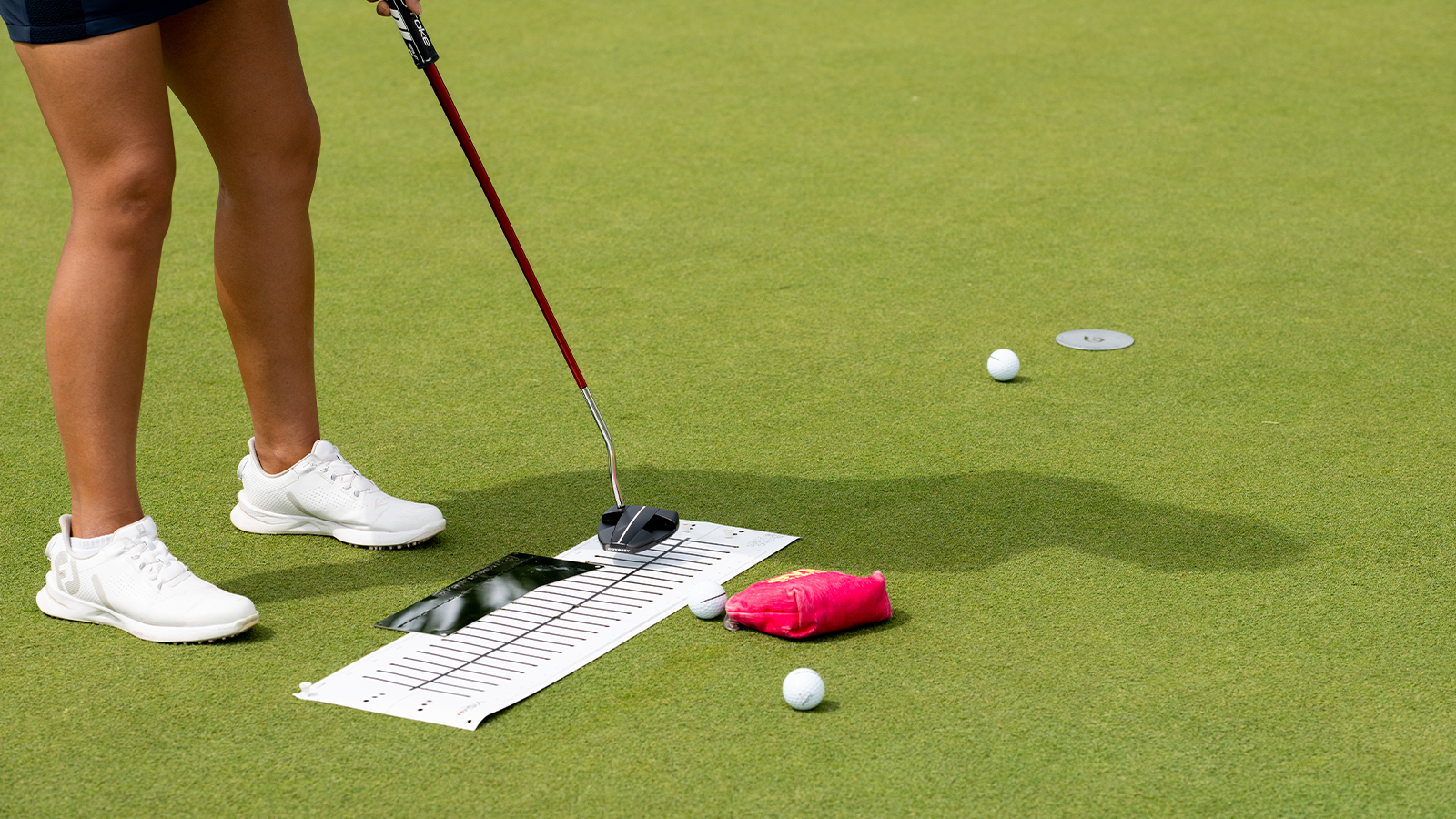 A contestant hit her putt during a practice round for the 2022 KPMG Women's PGA Championship at Congressional Country Club on June 21, 2022 in Bethesda, Maryland. (Photo by Matthew Harris/PGA of America)