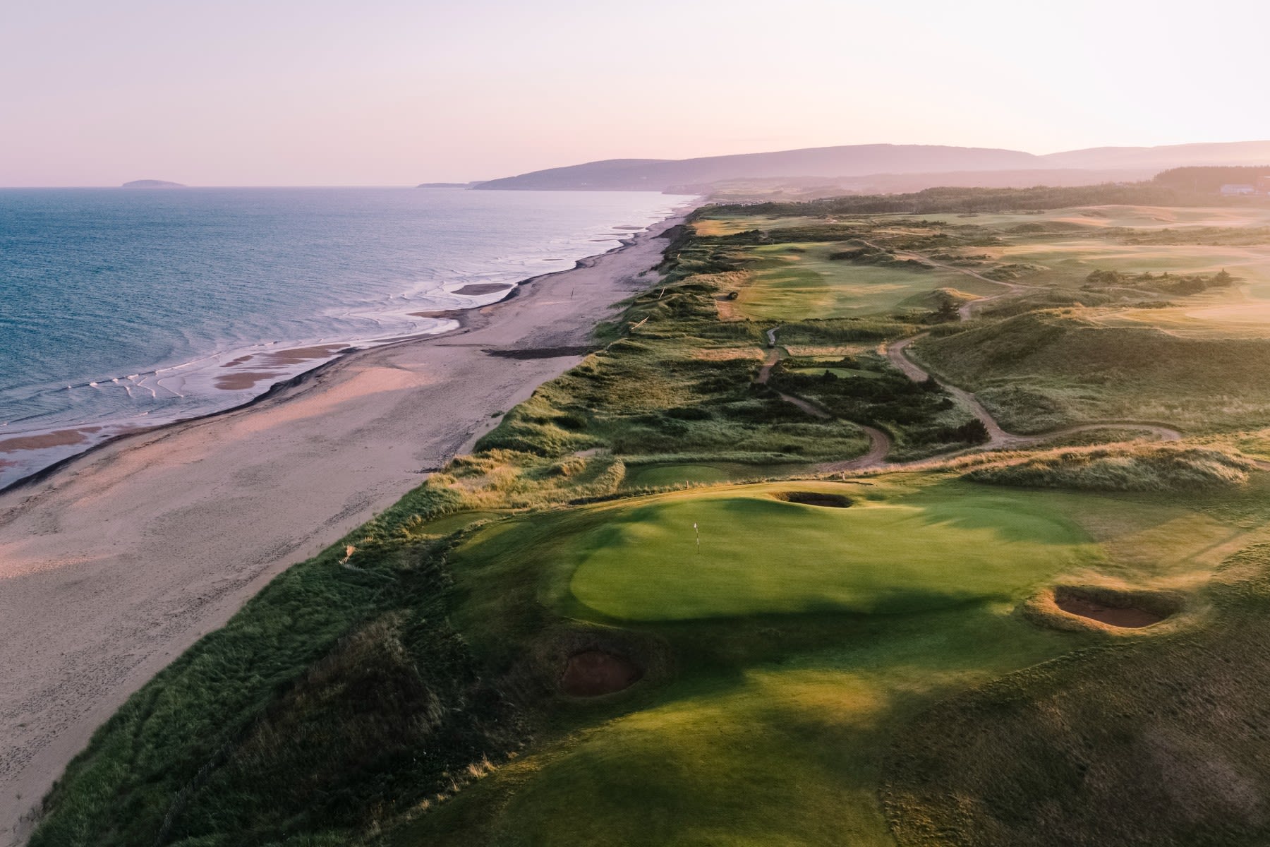 Whitman's signature design is the oceanside Cabot Links in Canada.