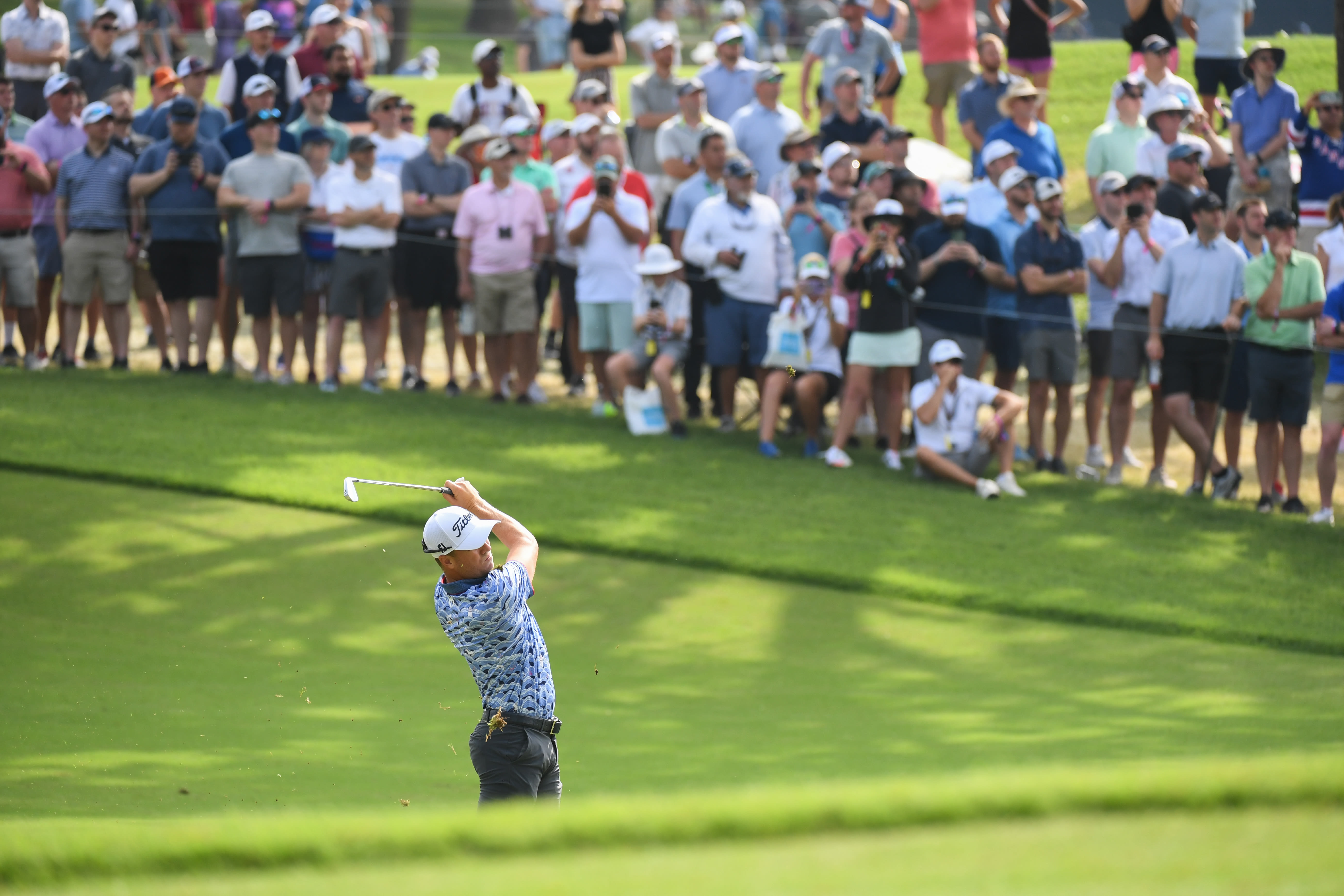 Justin Thomas hits his shot on the 18th hole during the second round of the 2022 PGA Championship at the Southern Hills on May 20, 2022 in Tulsa, Oklahoma.