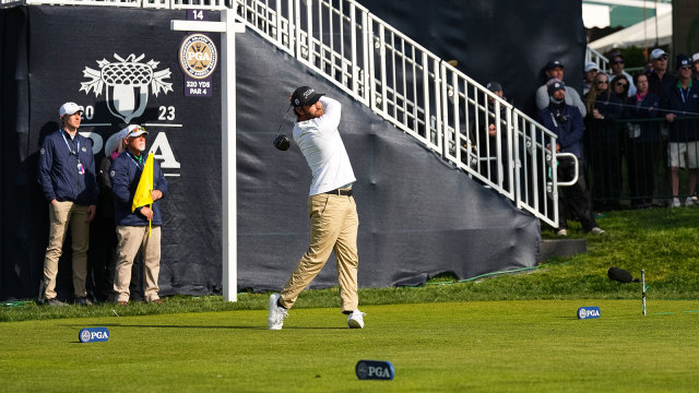 Braden Shattuck of the Corebridge Financial PGA Team hits his tee shot on the first hole during the first round of the PGA Championship at Oak Hill Country Club on Thursday, May 18, 2023 in Rochester, New York. (Photo by Darren Carroll/PGA of America)