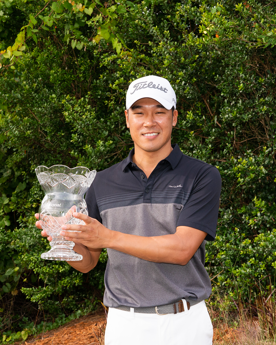 2021 Champion Jin Chung poses for a photo with the trophy after the final round of the 45th National Car Rental Assistant PGA Professional Championship held at the PGA Golf Club on November 14, 2021 in Port St. Lucie, Florida. (Photo by Hailey Garrett/PGA of America)