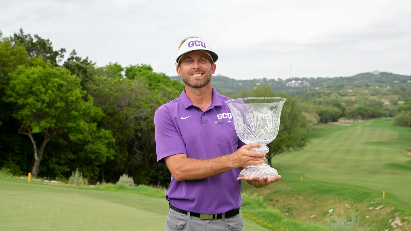 Jesse Mueller poses with the Walter Hagen Cup after the final round of the 54th PGA Professional Championship at the Omni Barton Creek Resort & Spa.