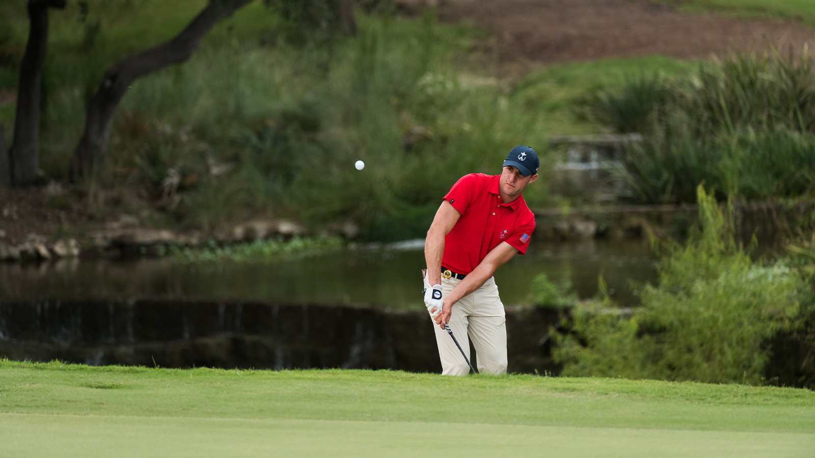 Alex Beach of the United States chips onto the eighth green during the Singles Matches for the 29th PGA Cup held at the Omni Barton Creek Resort & Spa on September 29, 2019 in Austin, Texas. (Photo by Montana Pritchard/PGA of America)