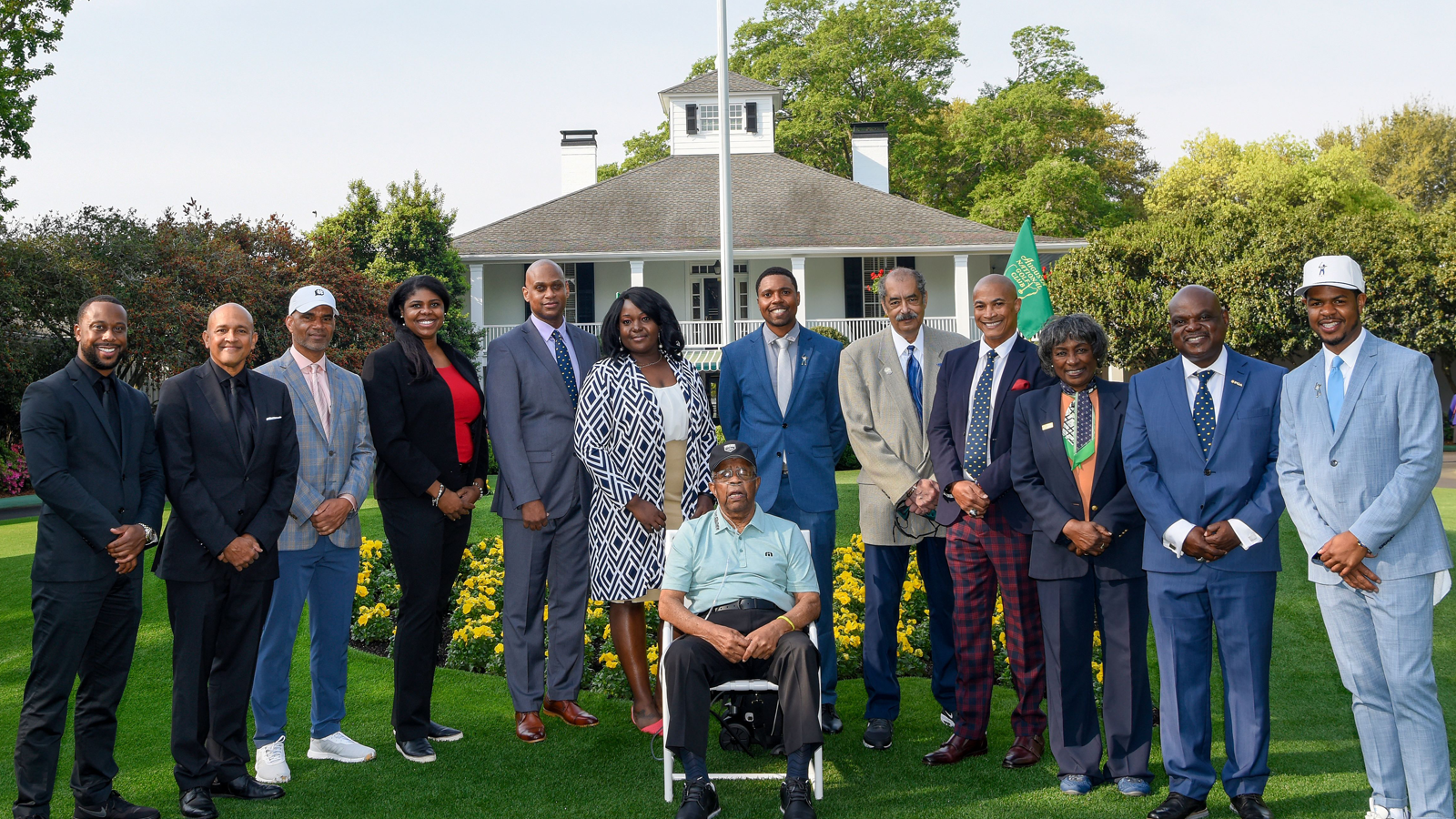 Meeting fellow PGA Members at the 2021 Masters. Center - Lee Elder, PGA L-R (standing): Kendall Murphy, PGA; Kennie Sims, PGA; Gerry Hammond, PGA; Maulana Dotch, PGA; Rich Jones, PGA; Mackenzie Mack, PGA; Wyatt Worthington, PGA; Howie Pruitt, PGA; Scooter Clark, PGA; Renee Powell, PGA; Jeff Dunovant, PGA; Earl Cooper, PGA