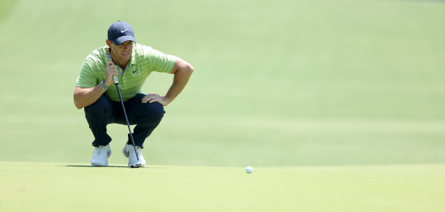 Rory McIlroy of Northern Ireland lines up a putt on the sixth green during the first round of the 2022 PGA Championship at Southern Hills Country Club on May 19, 2022 in Tulsa, Oklahoma. (Photo by Christian Petersen/Getty Images)