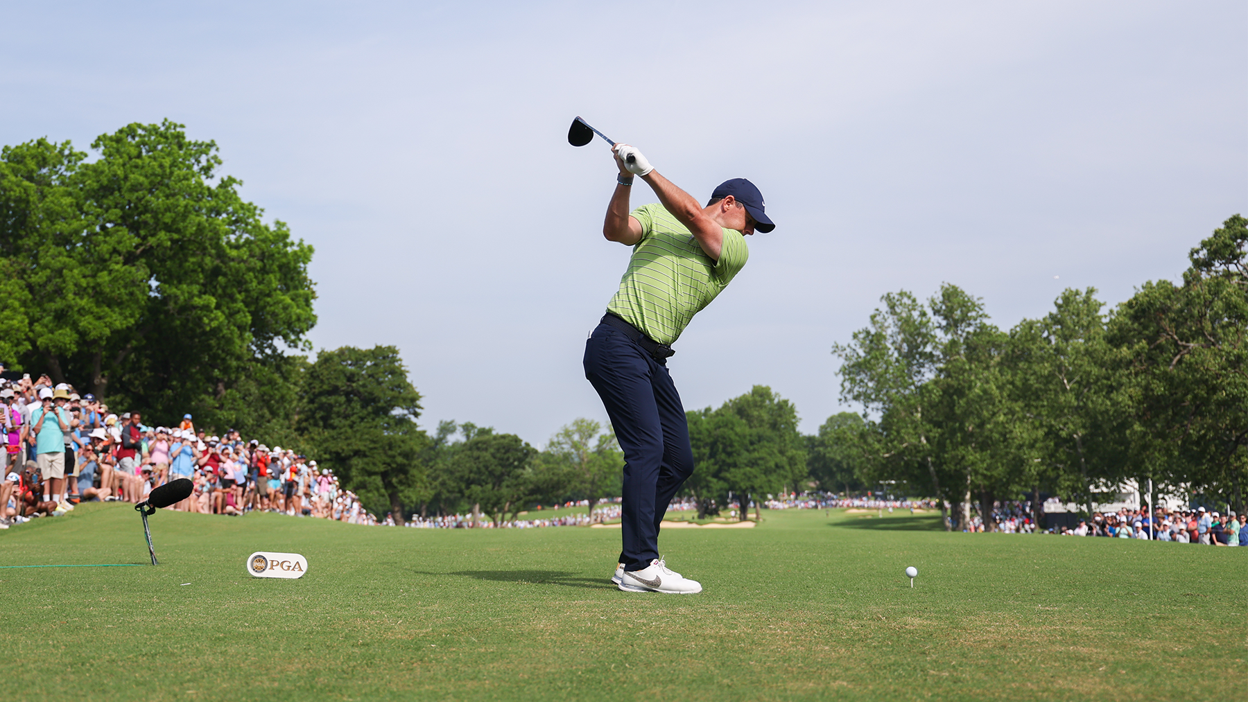 Rory McIlroy of Northern Ireland hits his shot from the 16th tee during the first round of the 2022 PGA Championship at the Southern Hills on May 19, 2022 in Tulsa, Oklahoma. (Photo by Maddie Meyer/PGA of America)