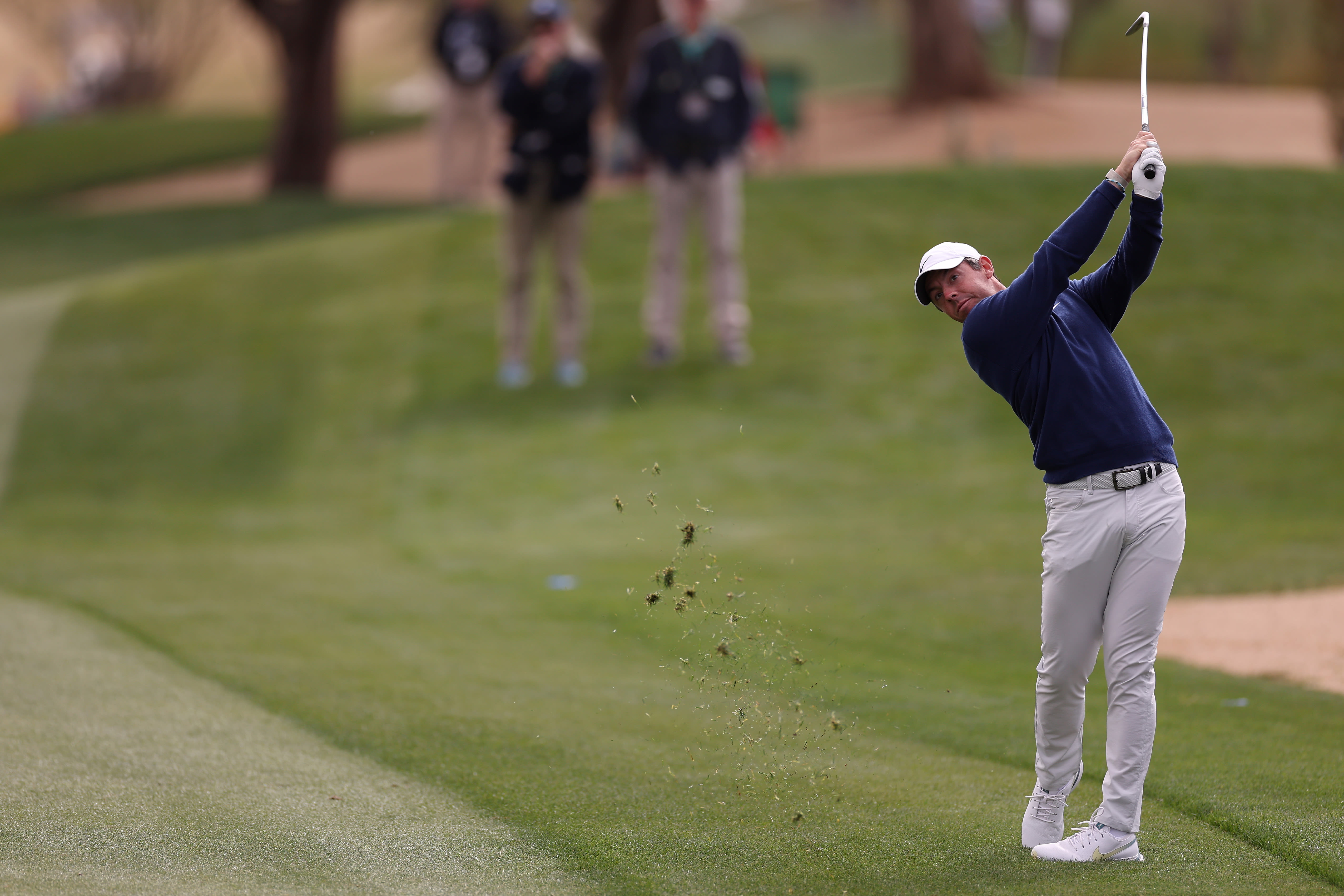 Rory McIlroy plays an approach shot on the 13th hole during the third round of the 2023 WM Phoenix Open. (Photo by Steph Chambers/Getty Images)