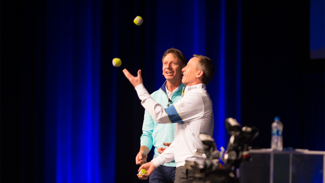 PGA Tour Veteran Brad Faxon and Michael Breed juggle for the attendees during the 2019 Teaching and Coaching Summit at the Orlando County Convention Center on January 21, 2019 in Orlando, Florida. (Photo by Hailey Garrett/PGA of America)