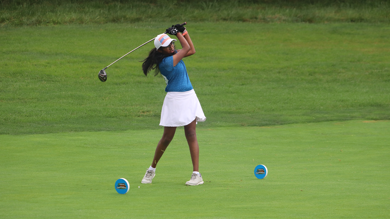 A participant holds her finish at the PGA Jr. League Philadelphia PGA Section Championship.