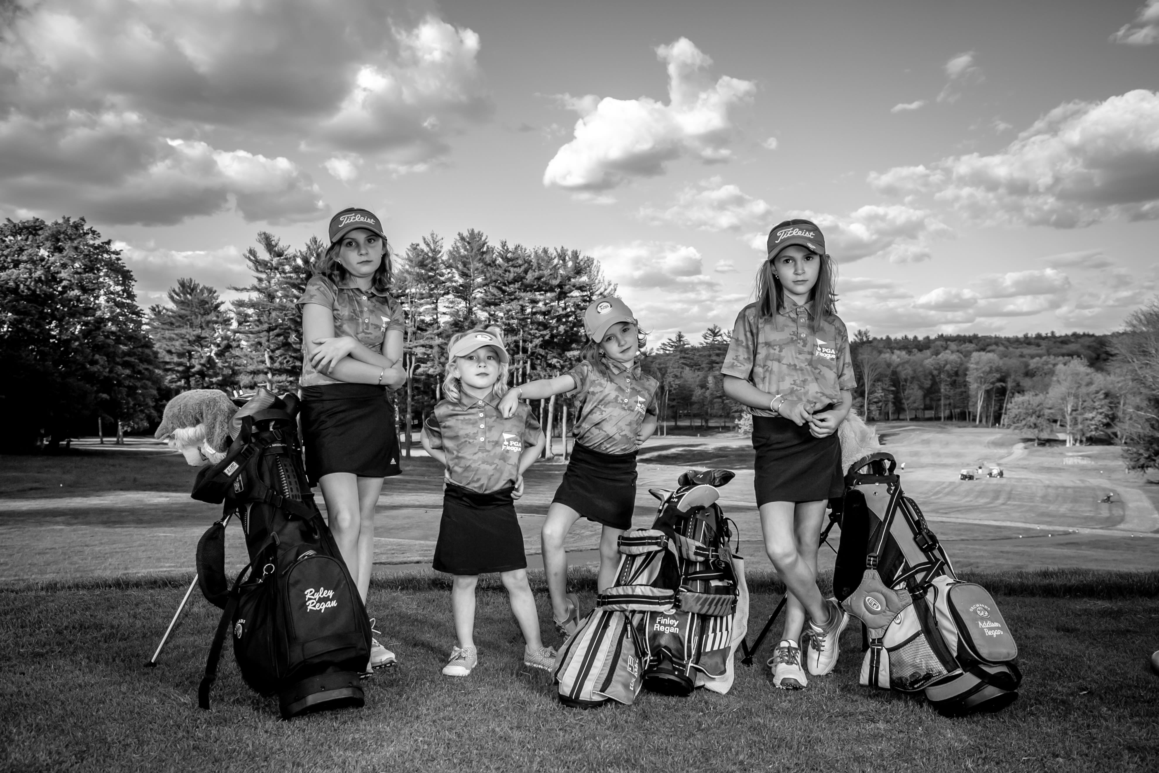The Regan sisters, pictured here in their PGA Jr. League jerseys, are serious about their love of golf.