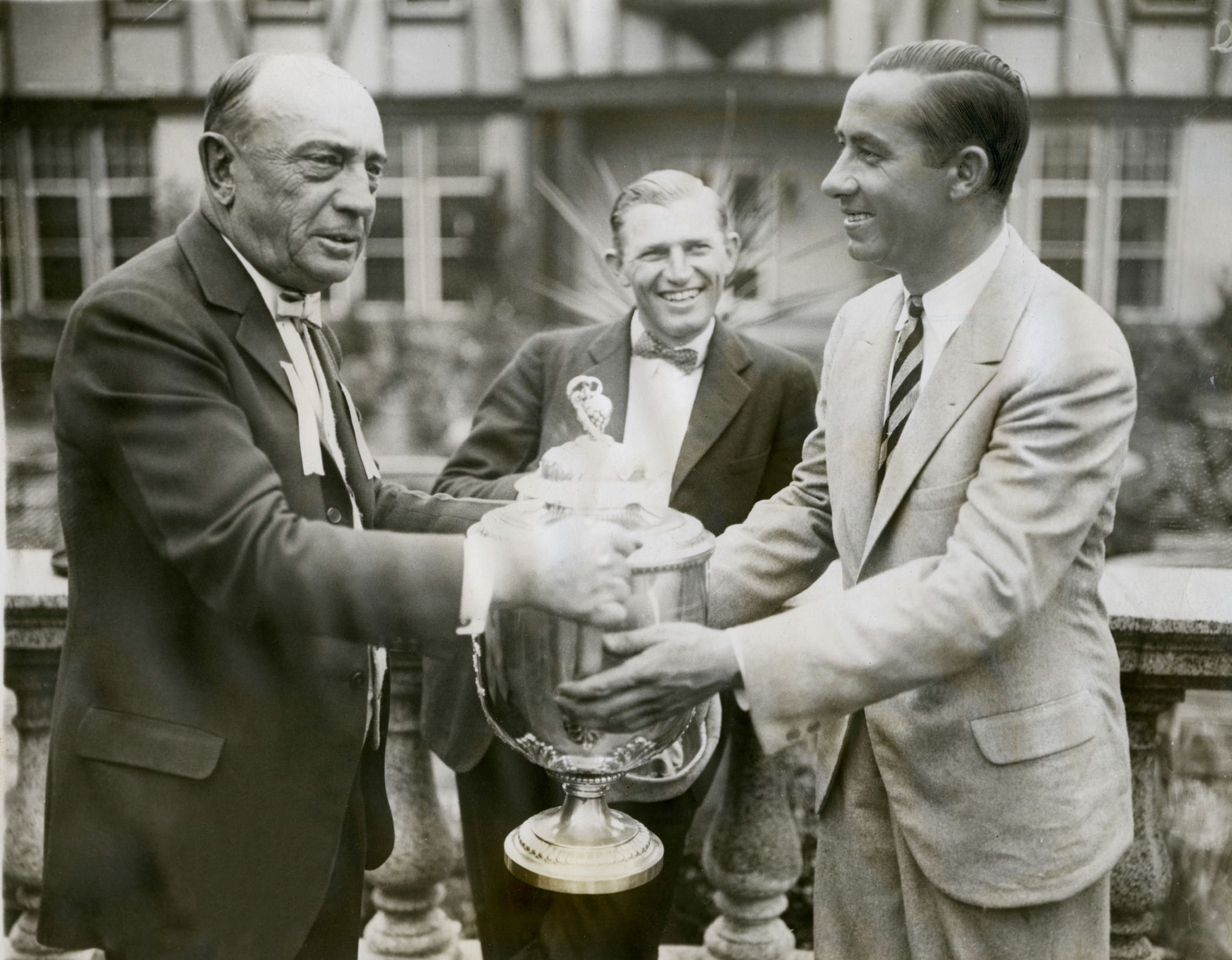 Walter Hagen presented the Wanamaker Trophy, September 26, 1925 by Olympia Fields C.C. President Charles Smalley, with Runner-Up Bill Mehlhorn looking on. (Image by permission of Olympia Fields)