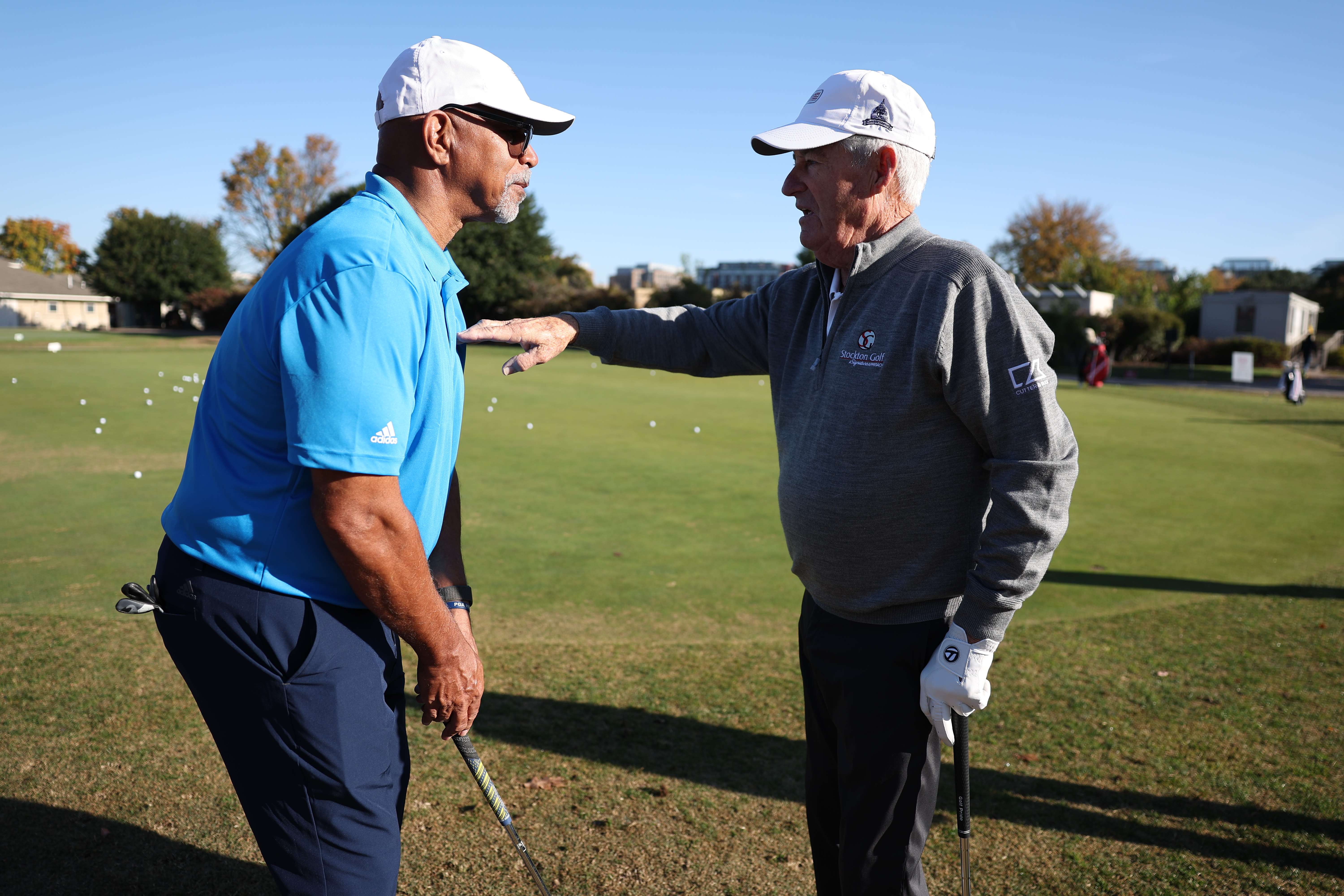 Coleman gets a few tips from two-time PGA Champion Dave Stockton.