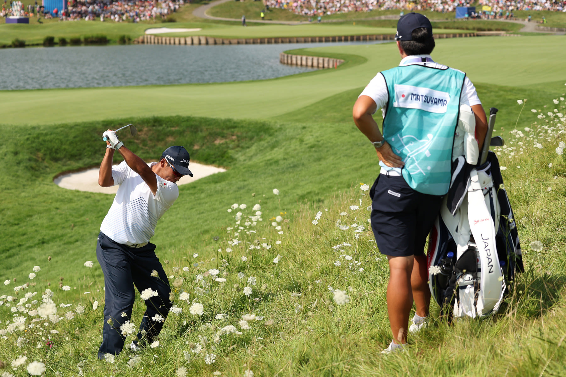 Hideki Matsuyama playing from the rough on No. 18.