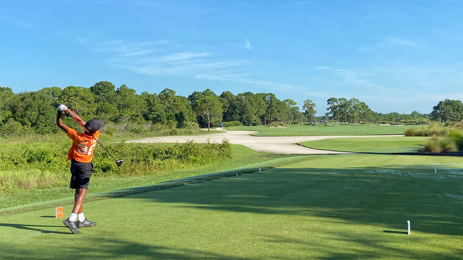 Player tees off at the National Car Rental PGA Jr. Regional at PGA Golf Club in Port St. Lucie, FL.