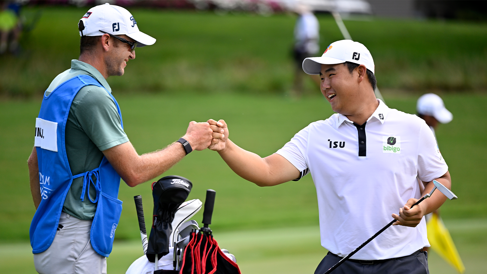 Joohyung Kim of Korea reacts to his birdie on the sixth hole during the final round of the Wyndham Championship at Sedgefield Country Club on August 07, 2022 in Greensboro, North Carolina. (Photo by Eakin Howard/Getty Images)