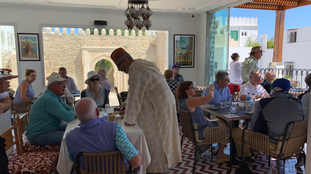 The travel party enjoying lunch in Morocco. 