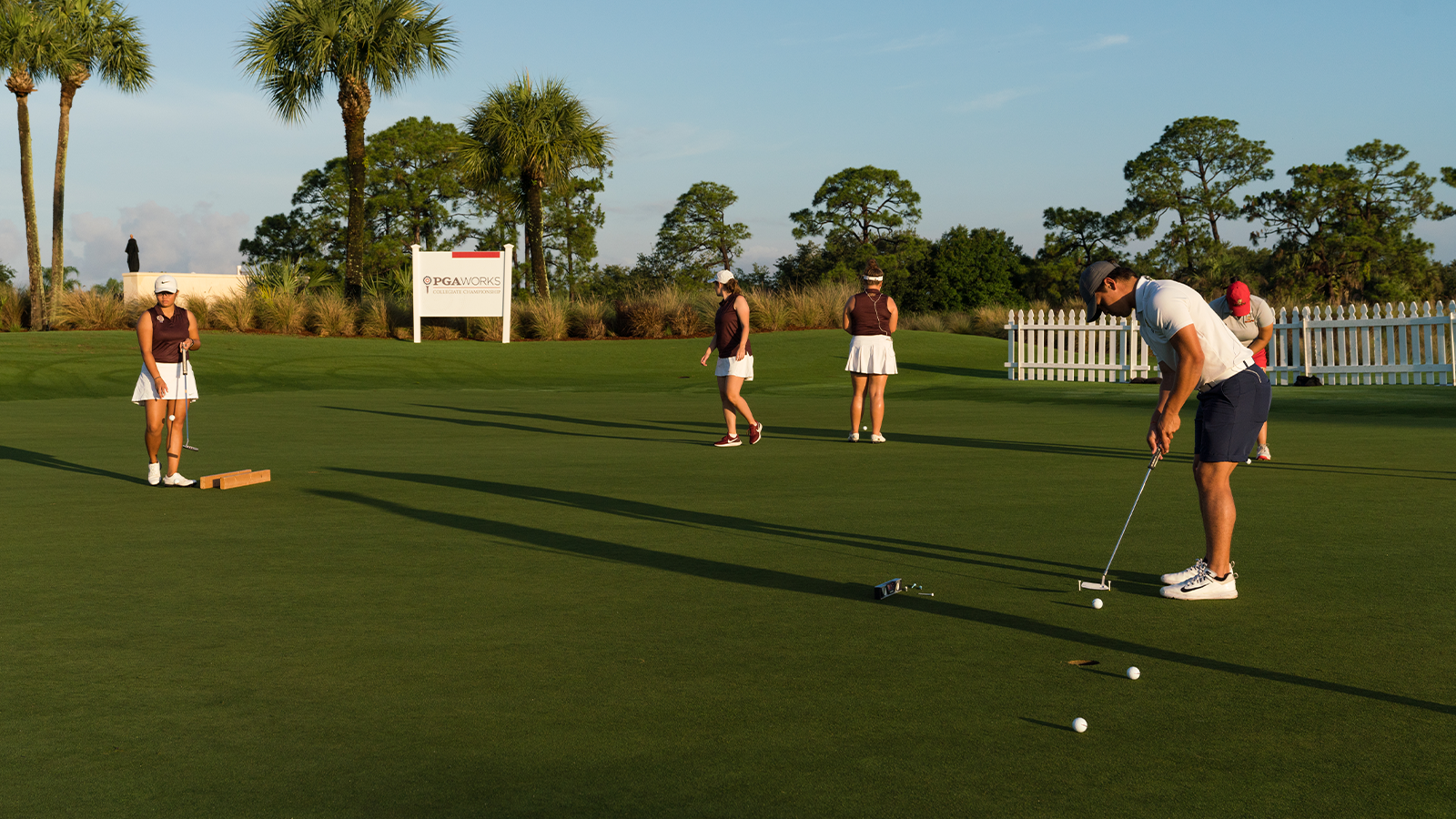 Players putting at the practice green during the first round of the 33rd PGA WORKS Collegiate Championship held at The PGA Golf Club at PGA Village on May 10, 2019 in Port St. Lucie, Florida. (Photo by Darren Carroll/PGA of America)